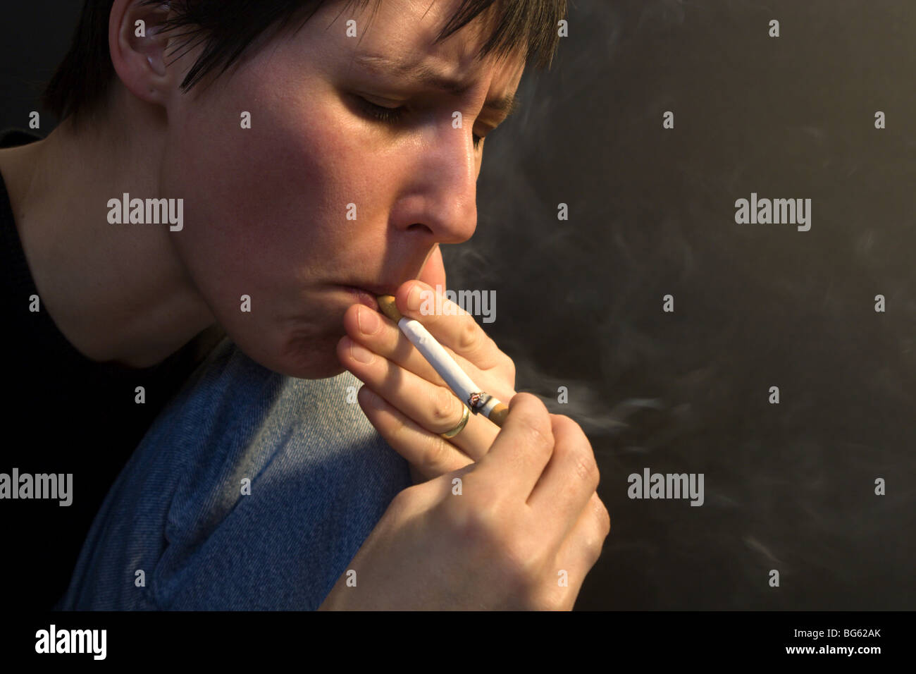 smoking of woman Stock Photo