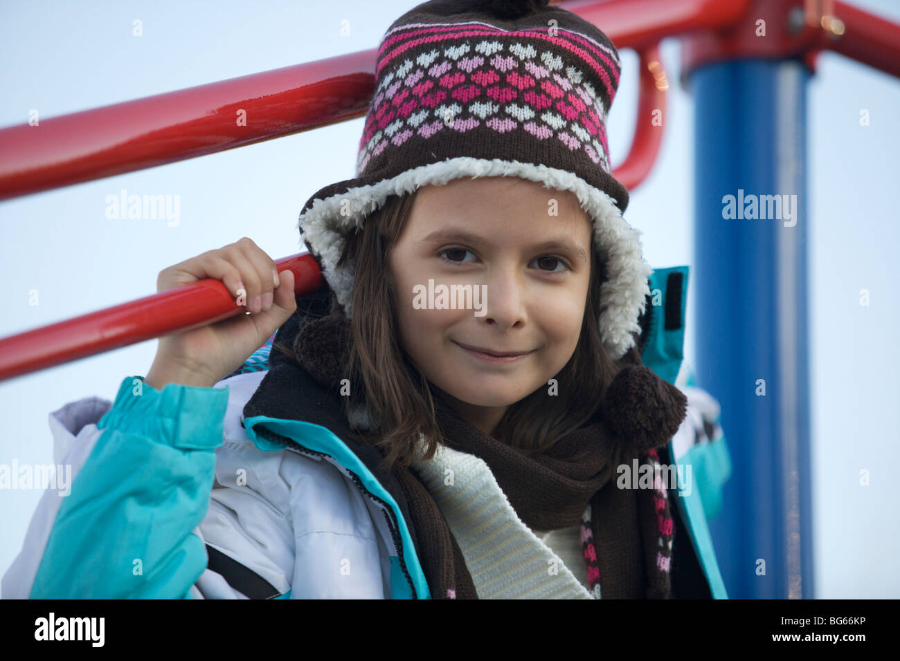 Happy young girl playing at the playground Stock Photo - Alamy