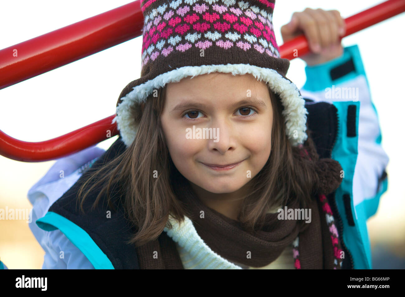 Happy young girl playing at the playground Stock Photo - Alamy