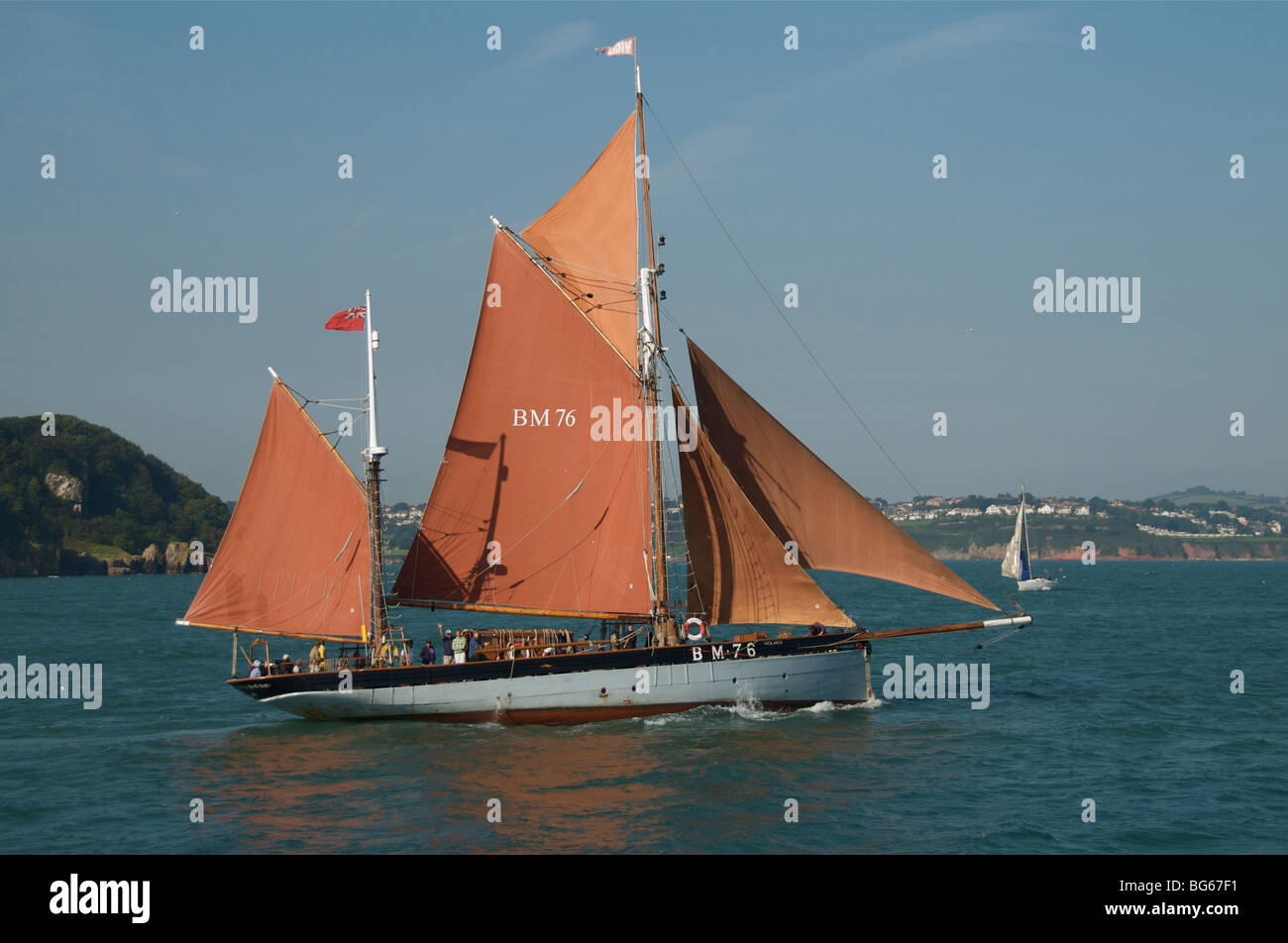 The historic trawler Vigilance sailing out of Brixham harbour Stock