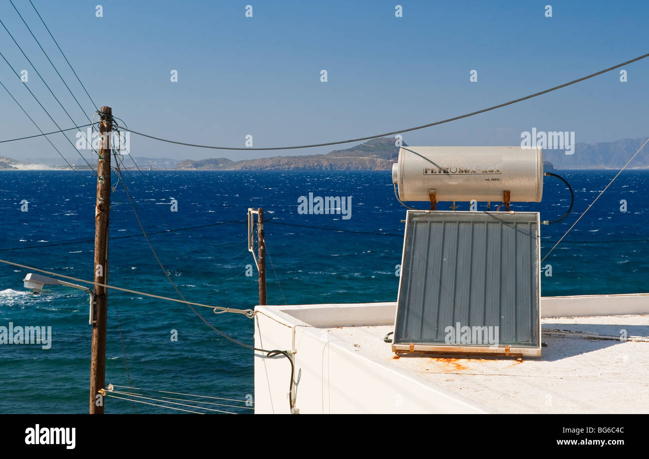 Solar powered domestic water heating system with solar panel and tank