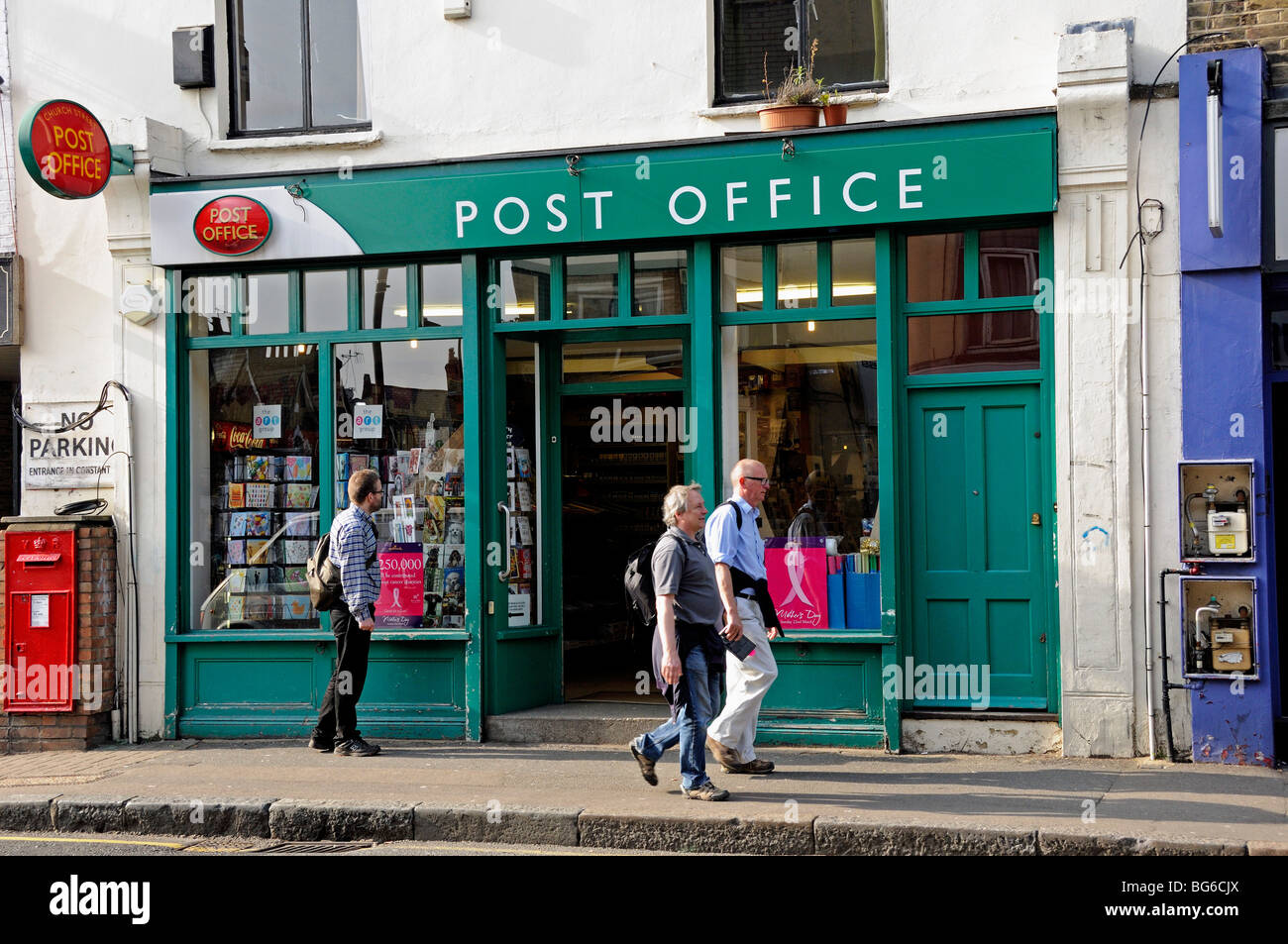Post Office with people walking past Stoke Newington Church Street