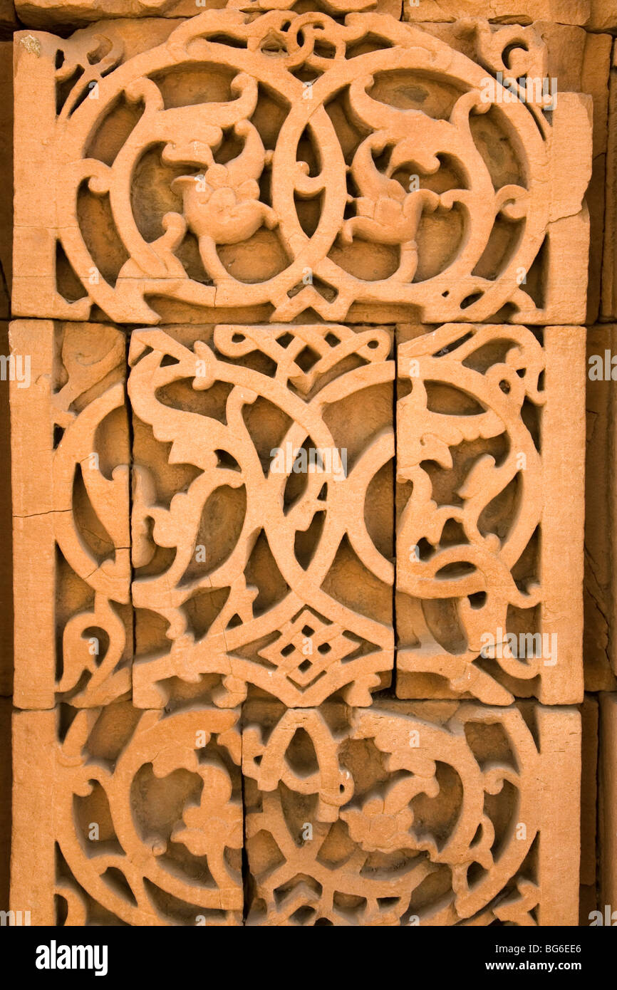 An ornate detail from the inscriptions and carvings on Iltutmish's Screen at the Qutb Minar Complex in Delhi, India. Stock Photo
