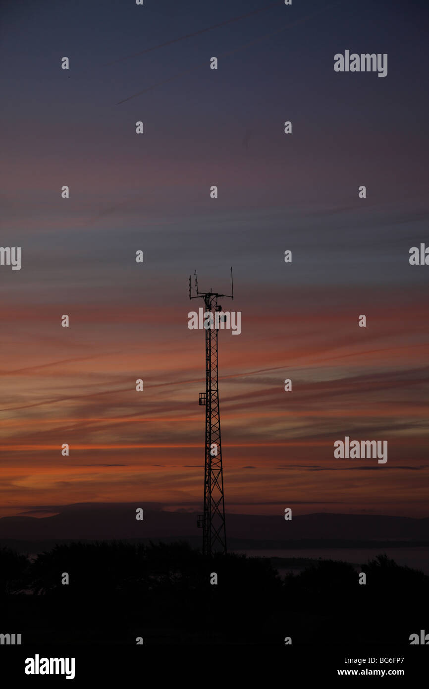 radio mast at sunrise Carmarthenshire hills Stock Photo