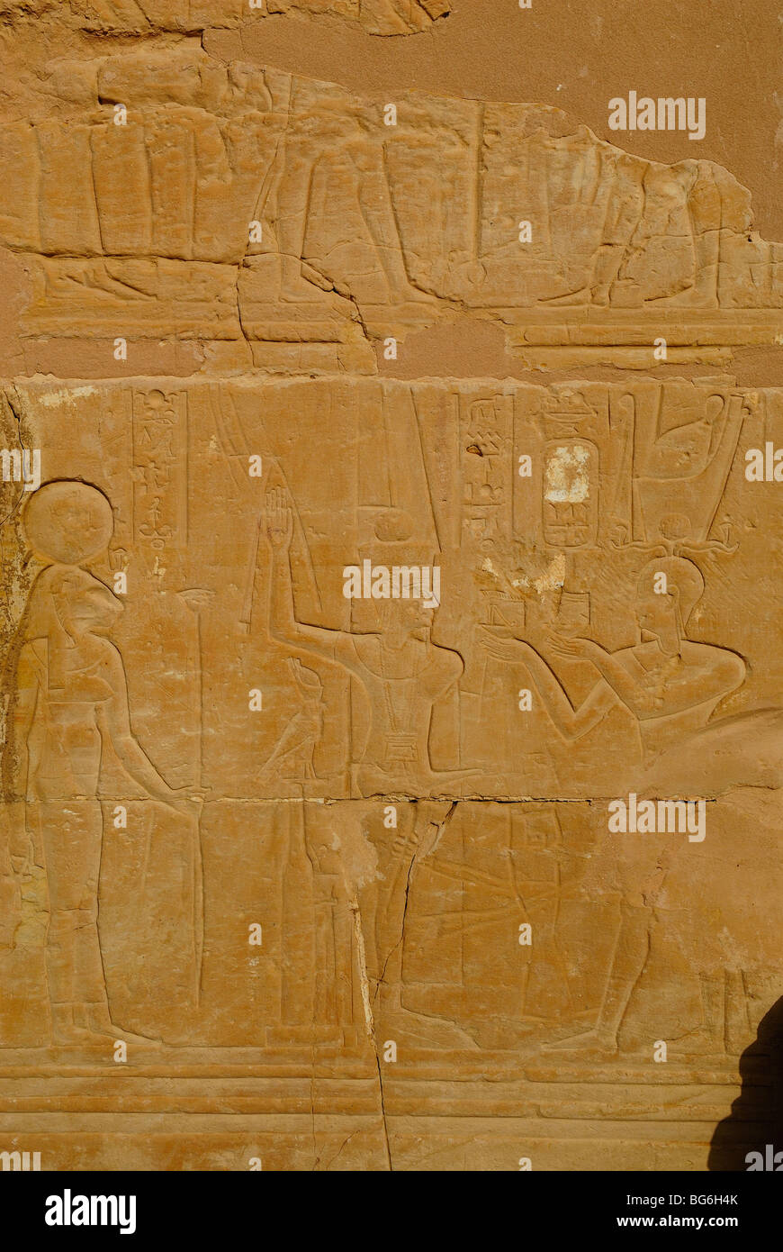 Reliefs representing gods on a wall on Deir al-Hagar Temple, western desert of Egypt Stock Photo