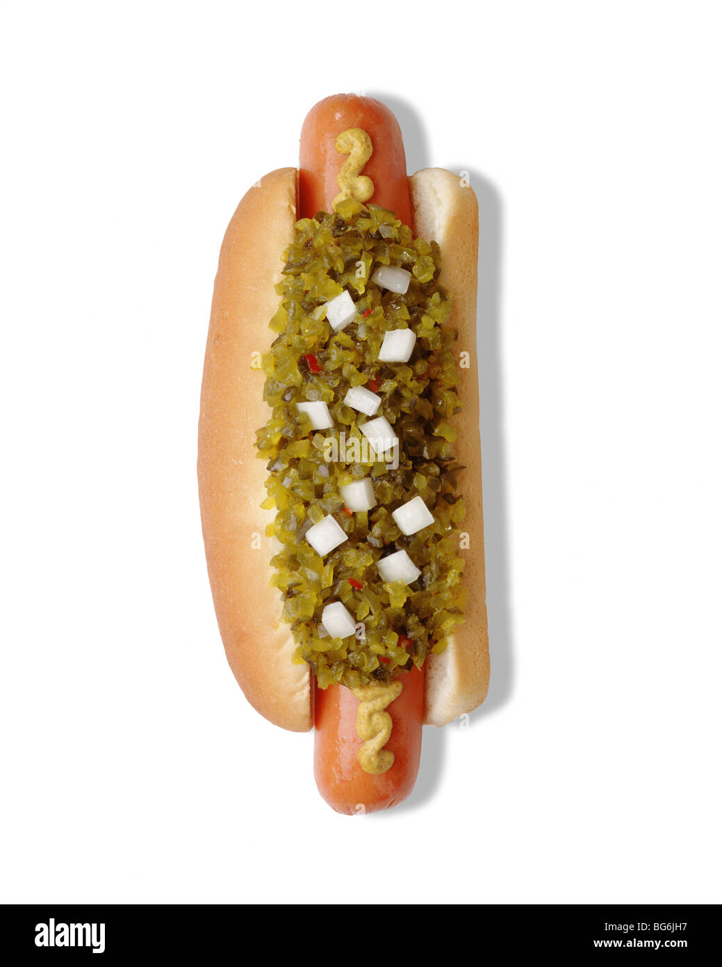 Hot dog with mustard, pickle relish and onions on white Stock Photo Alamy