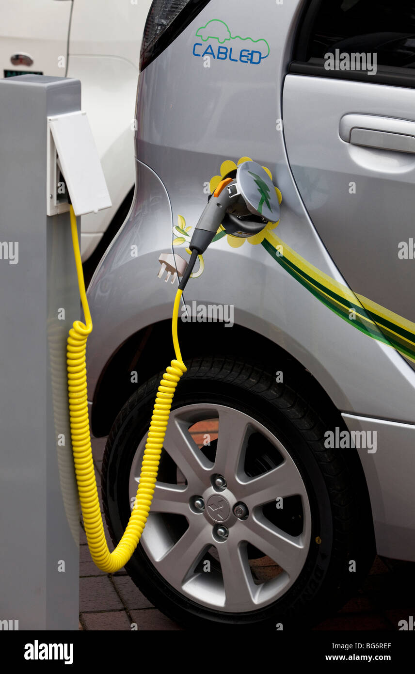 The electric 're-fuelling' hook up on a new Mitsubishi i-MiEV electric motor car, England, UK Stock Photo