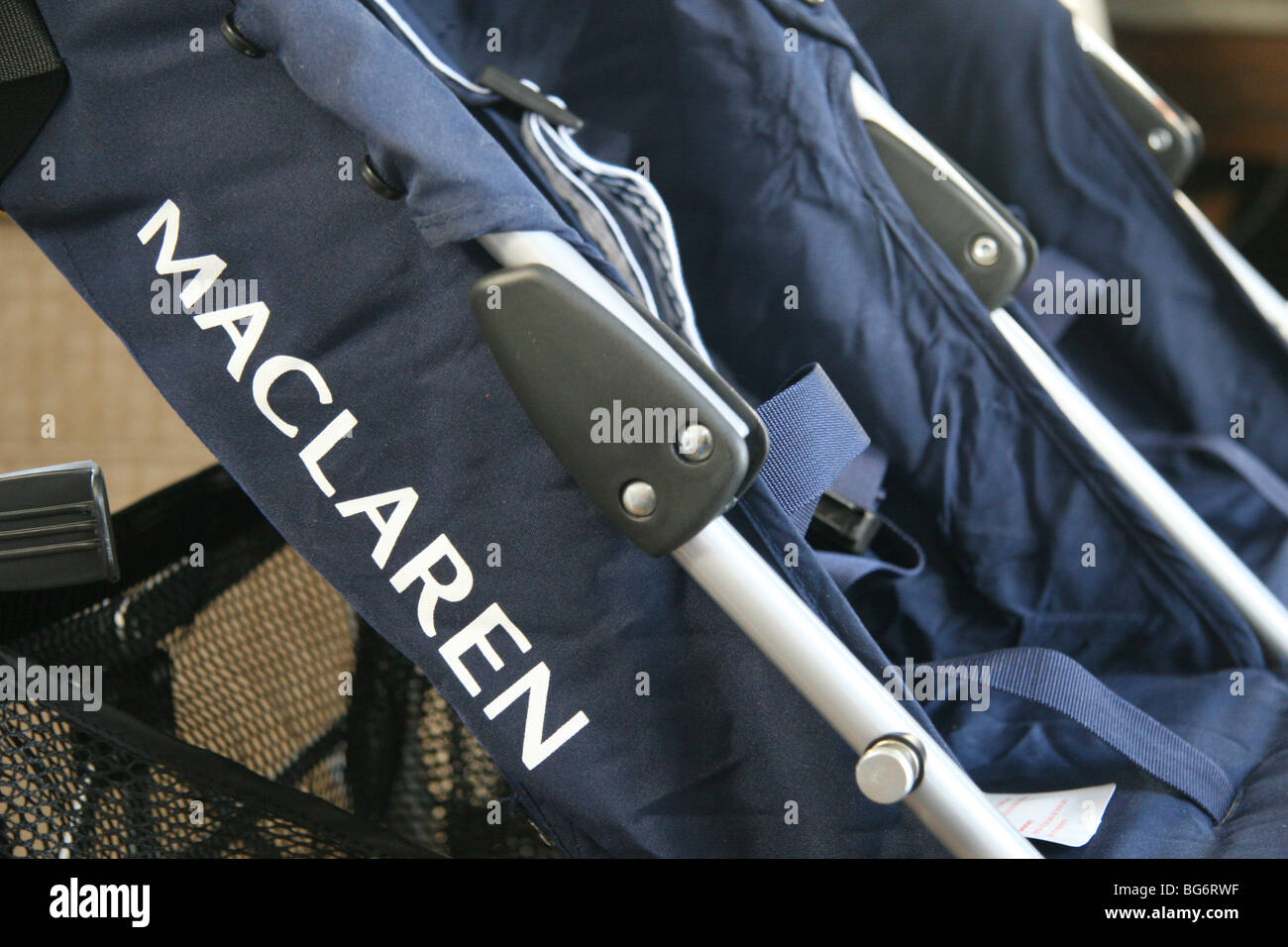 Maclaren stroller hinge involved in recall, shown on a Twin Triumph stroller. Stock Photo