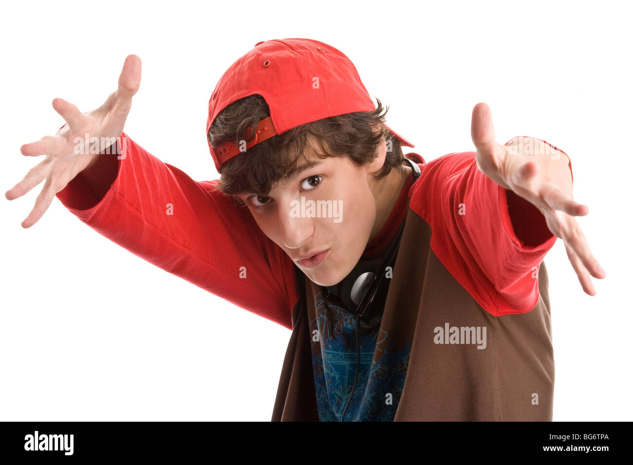 Intimidating teenage boy isolated on white background Stock Photo