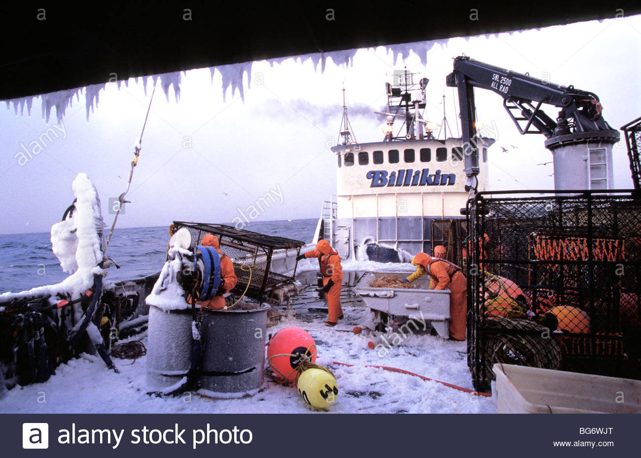 Ice covers the deck on a crab fishing boat in the Bering Sea Stock