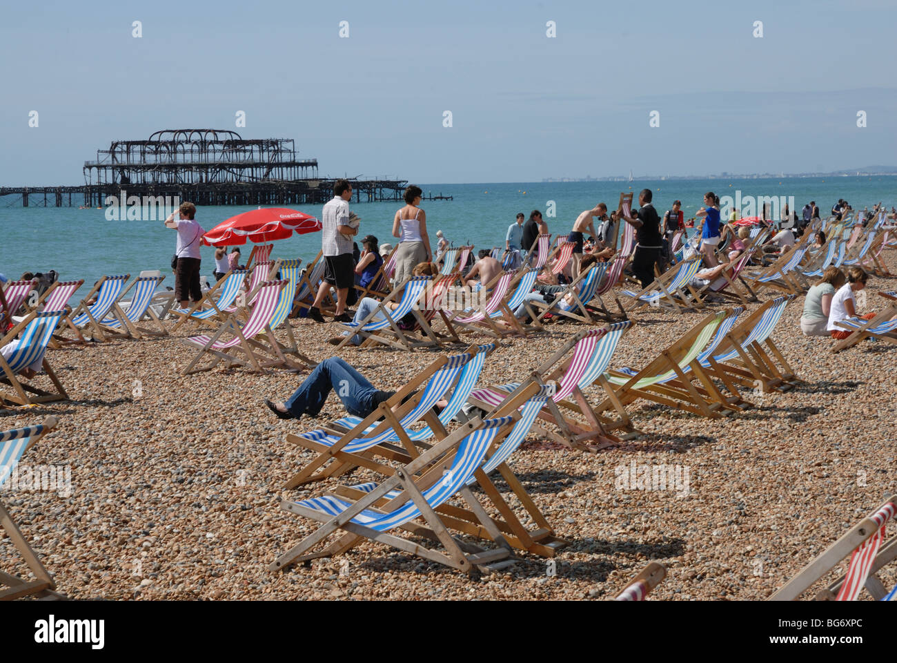 Brighton beach pier deck chair hi-res stock photography and images - Alamy