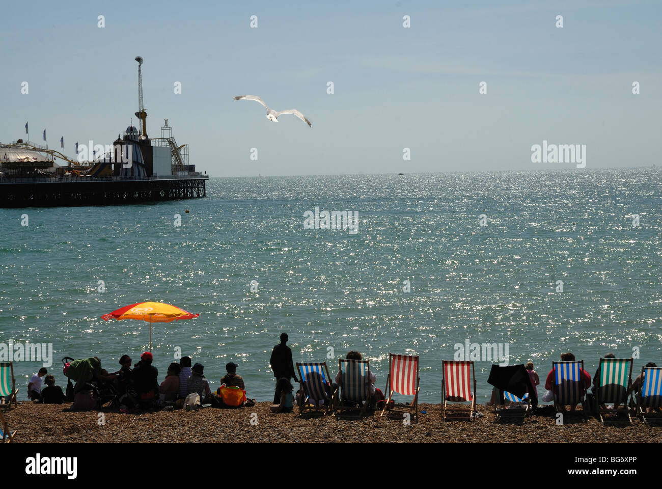 Brighton beach pier deck chair hi-res stock photography and images - Alamy