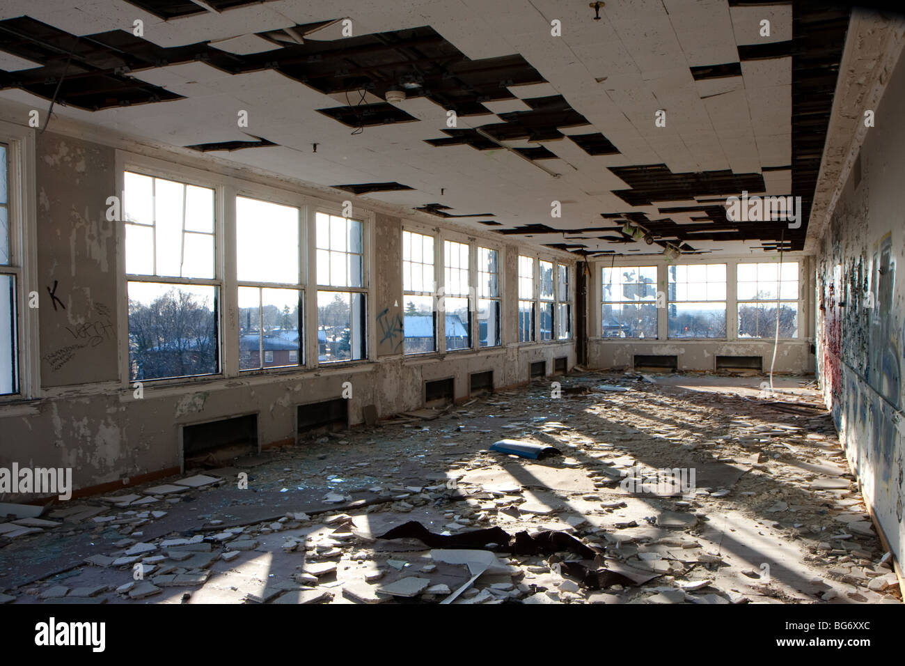 abandon industrial building interior broken window Stock Photo