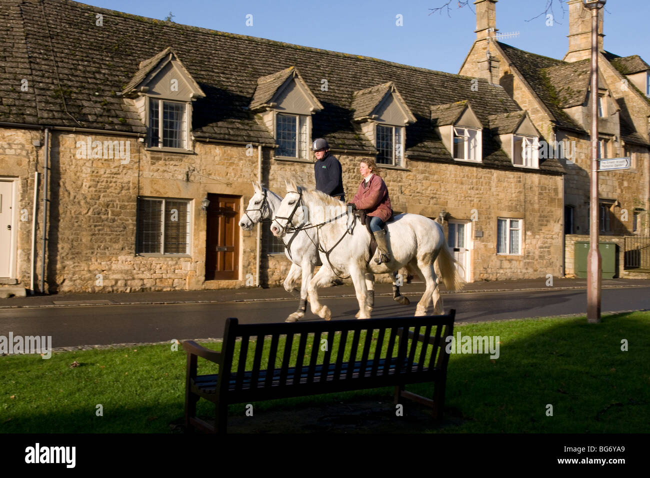 Chipping Campden Gloucestershire England UK Two horse riders Stock