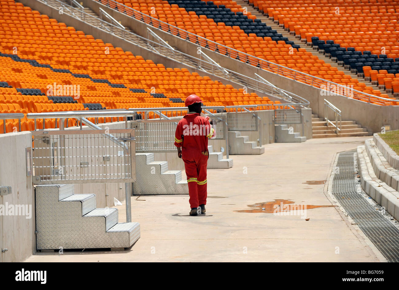 Construction worker at soccer stadium in johannesburg, south africa - host venue for the FIFA 2010 South Africa World Cup Stock Photo