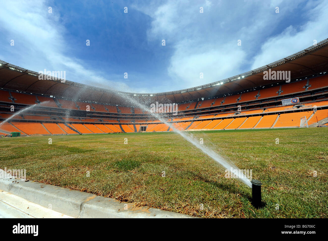 watering the pitch at Soccer City Stadium in Johannesburg, South Africa