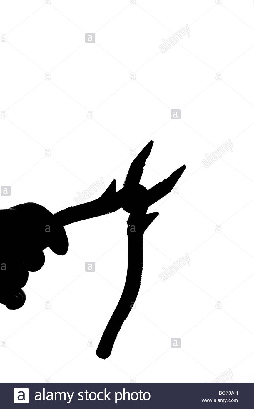 Silhouetted pliers Stock Photo