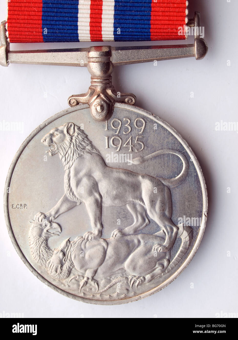 Close up of the reverse side of a World War 2 Medal awarded to British and Commonwealth Troops 1939-45 on a white background  Stock Photo