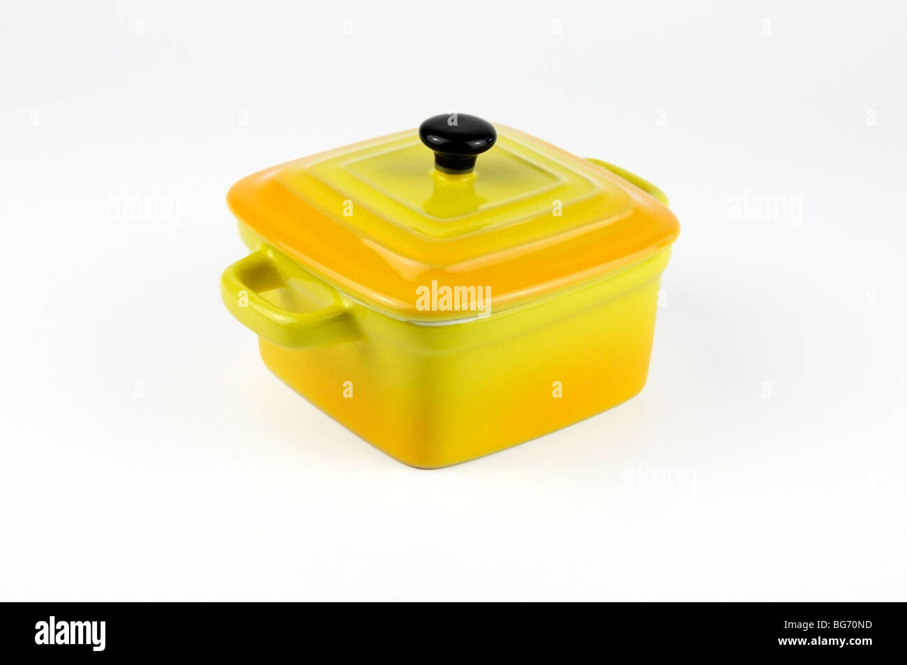 Yellow pot lid square white background hires stock photography and