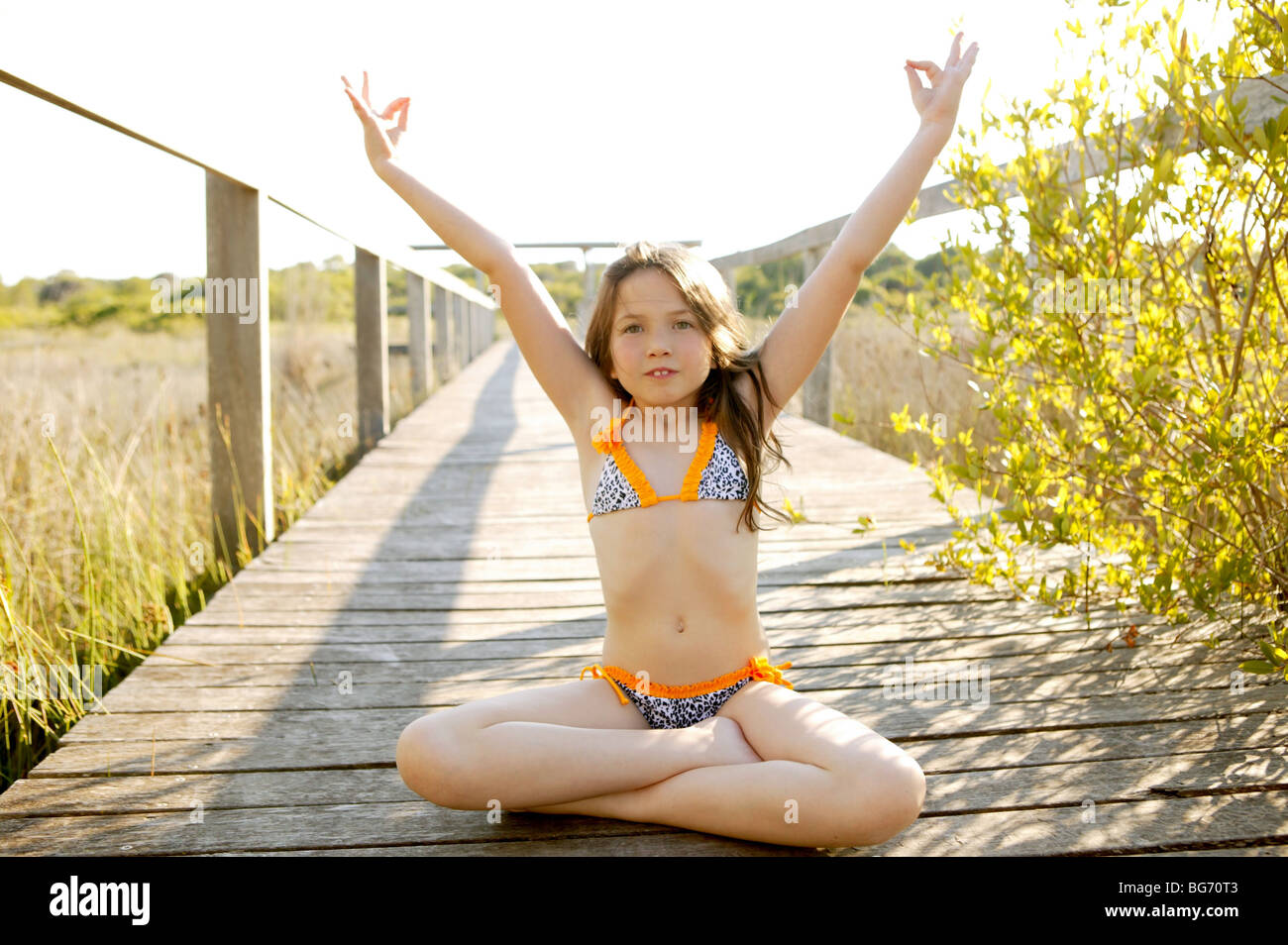 beautiful relaxed zen teen meditation in bikini, summer park outdoors Stock  Photo - Alamy