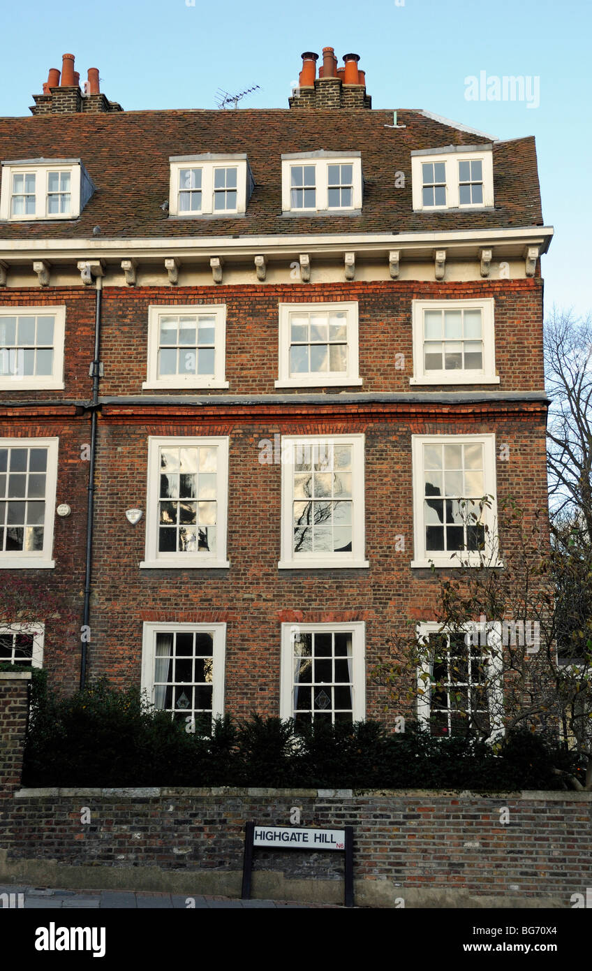 House Highgate Hill with light reflecting in the windows London England