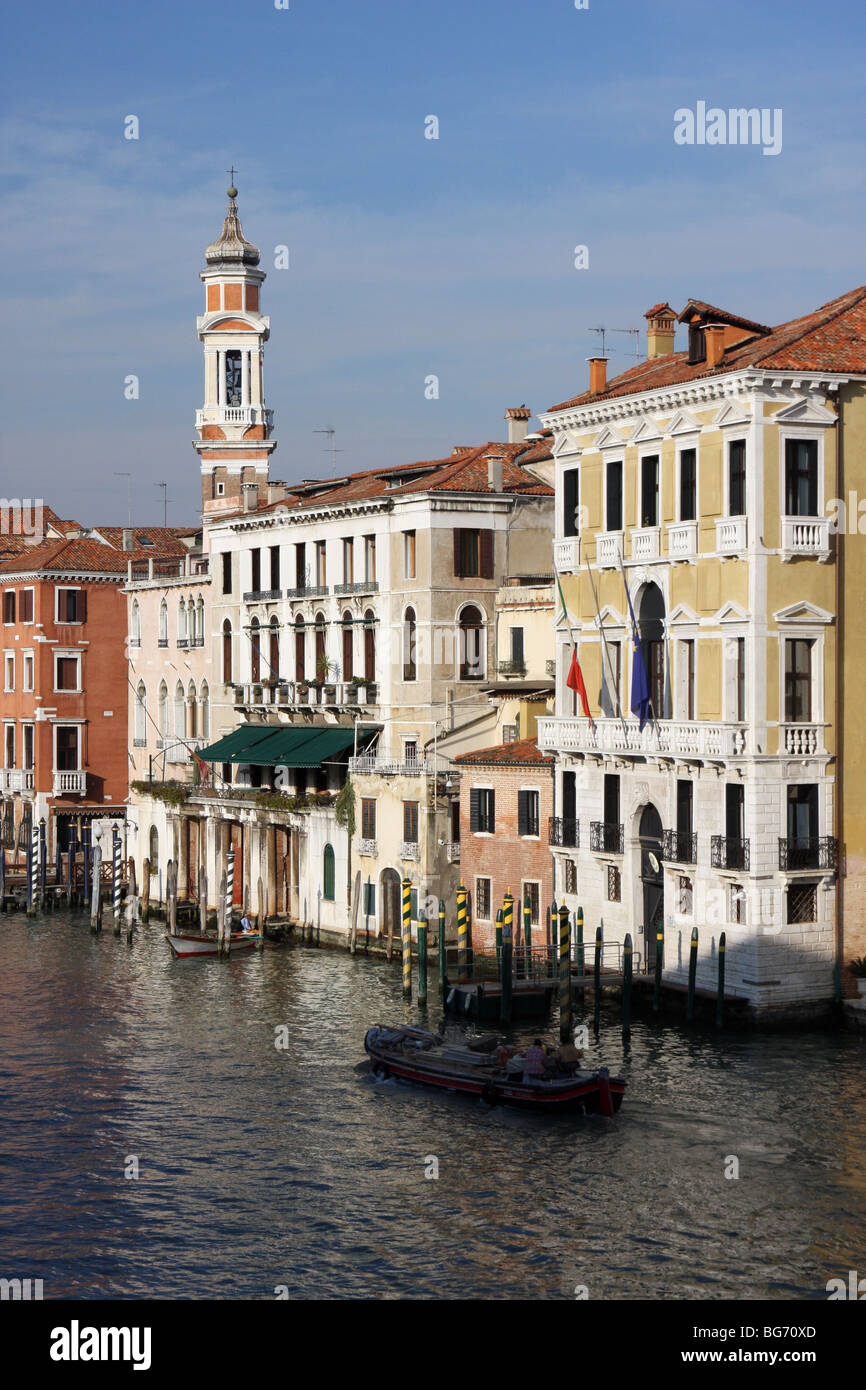 Façades of houses and palaces by the Grand Canal in Venice seen from Rialto Bridge Stock Photo