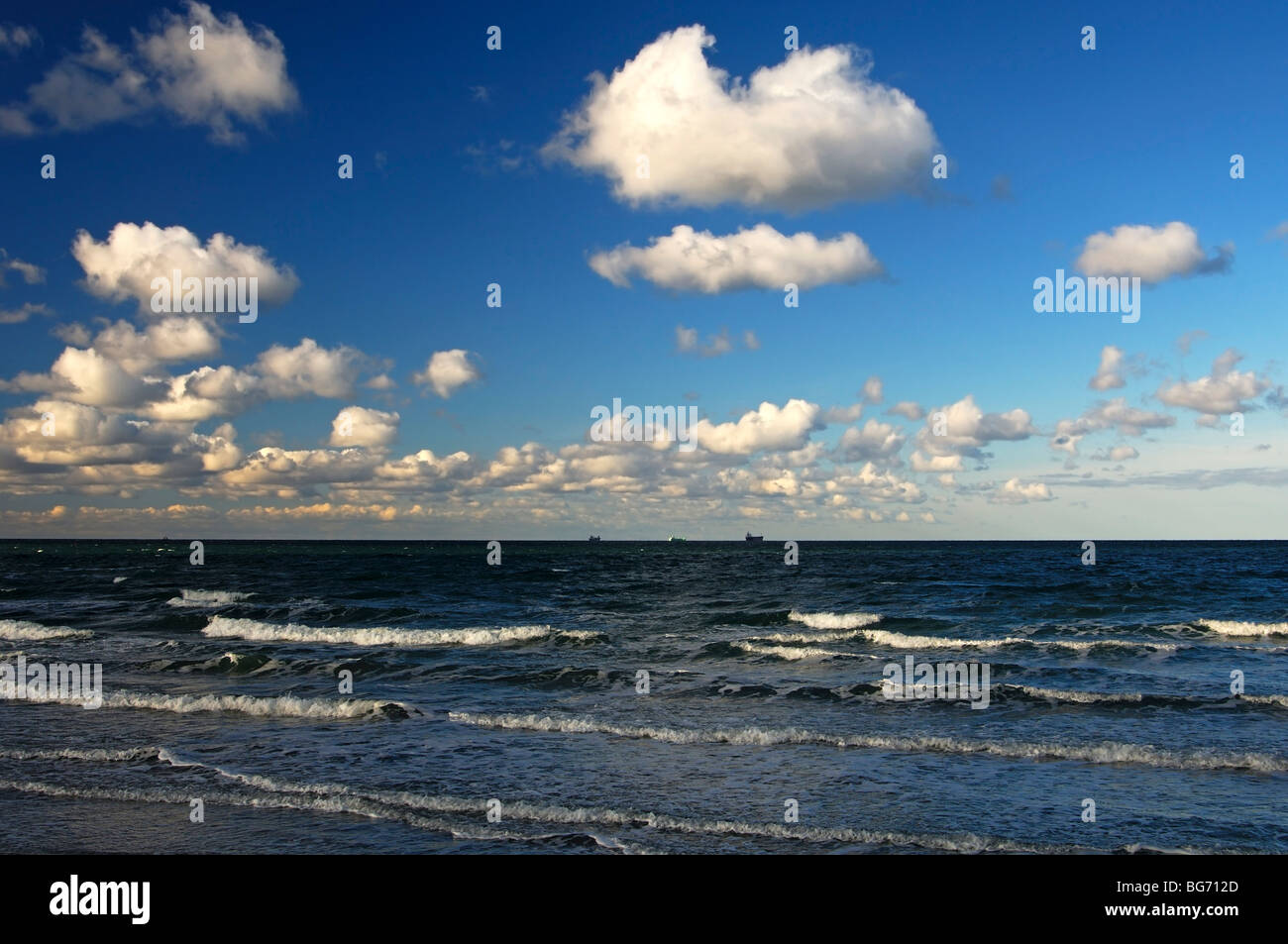Motion-blurred sea with white wave crests under a cloudy sky, Baltic Sea, Rostock-Warnemuende, Germany Stock Photo