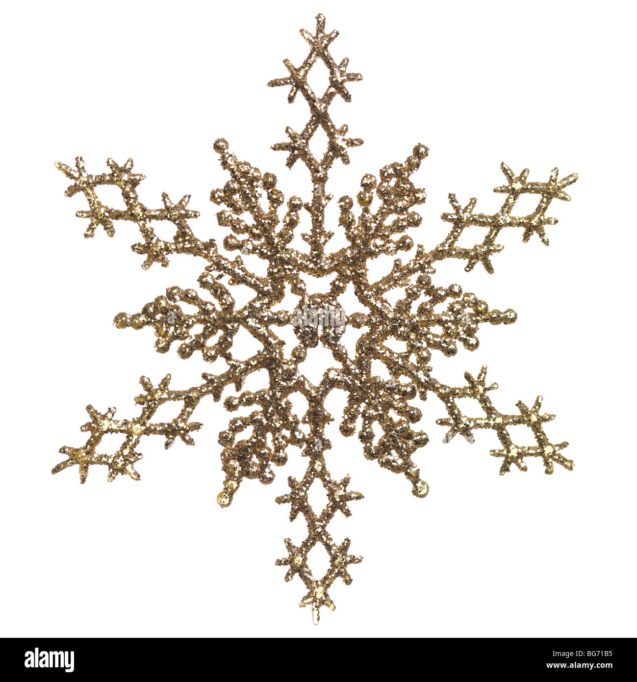 Shiny golden snowflake ornament Christmas tree decoration isolated on white background Stock Photo
