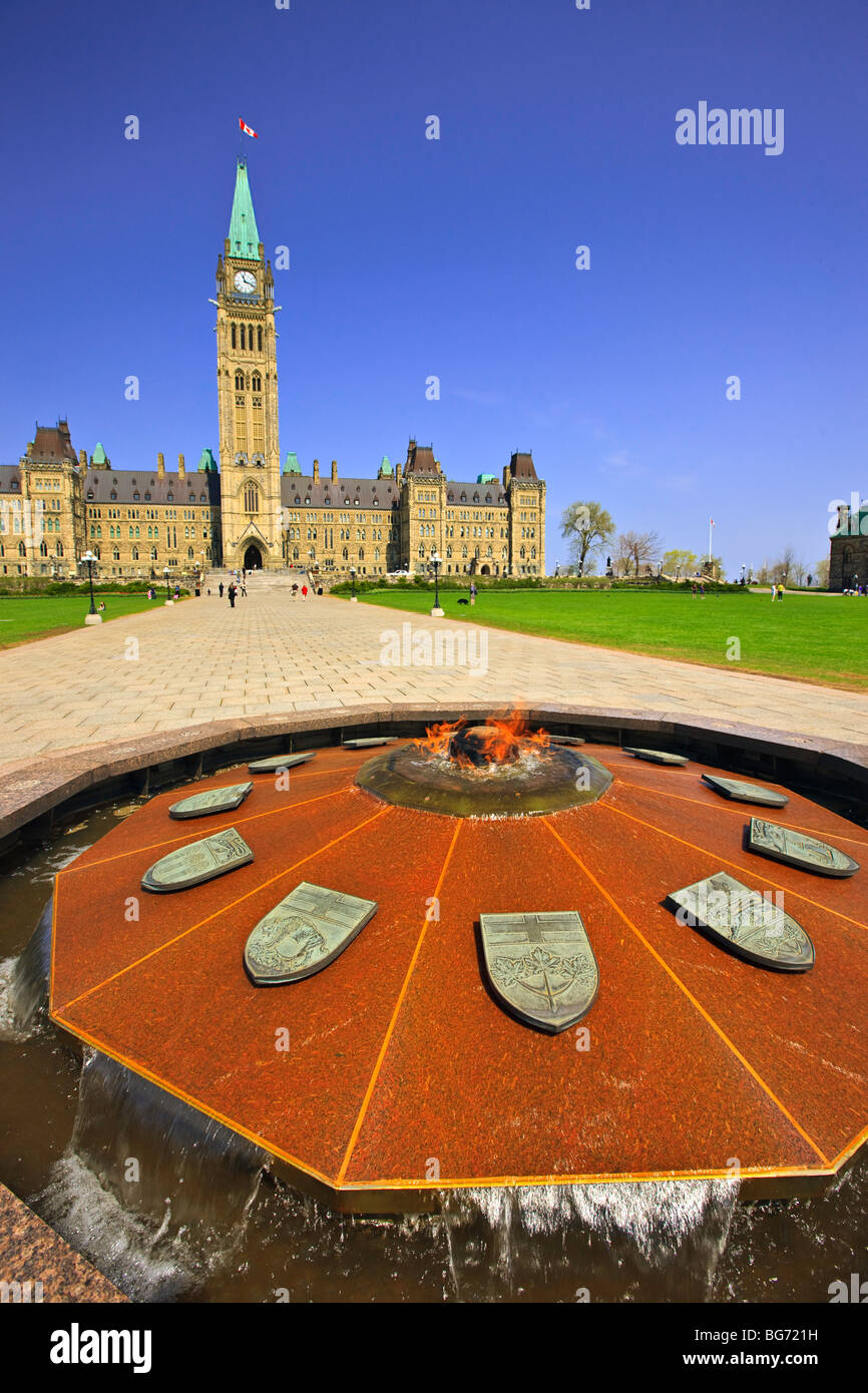 Centre Block and Peace Tower of the Parliament Buildings and the Centennial Flame, Parliament Hill, Ottawa, Ontario, Canada. Stock Photo