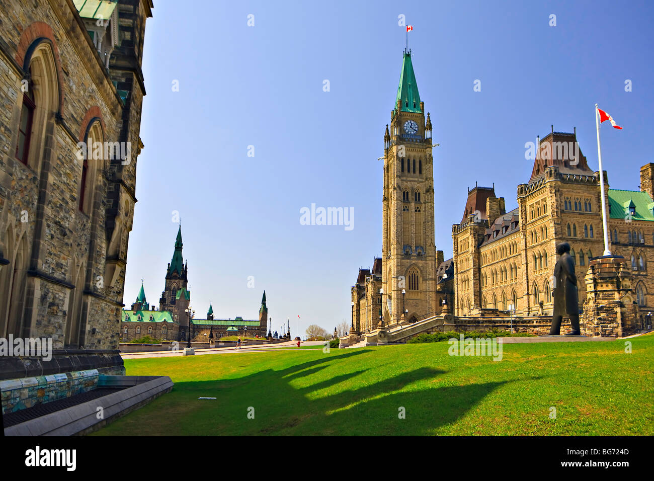 Centre Block and Peace Tower of the Parliament Buildings flanked by the East and West Blocks on Parliament Hill, City of Ottawa, Stock Photo