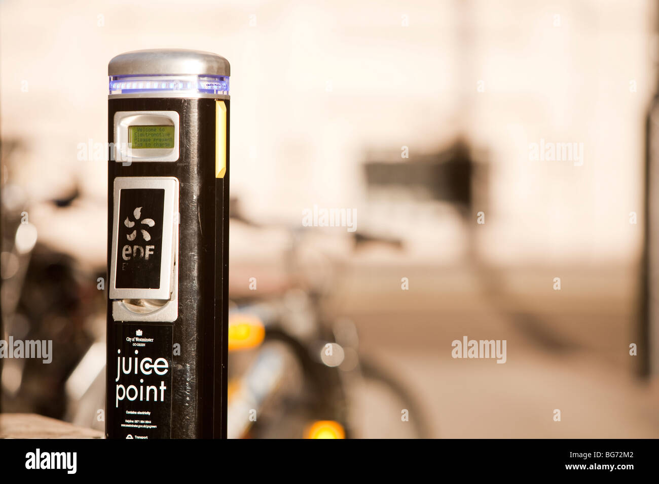 An electric vehicle re charging Juice Point in Westminster, london, UK. Stock Photo
