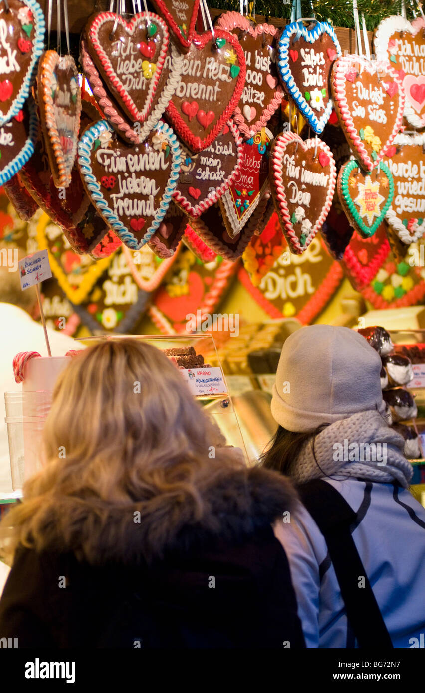 Two children looking at a stall at the Christmas market held at the Rathaus (Town Hall) in Vienna, Austria Stock Photo