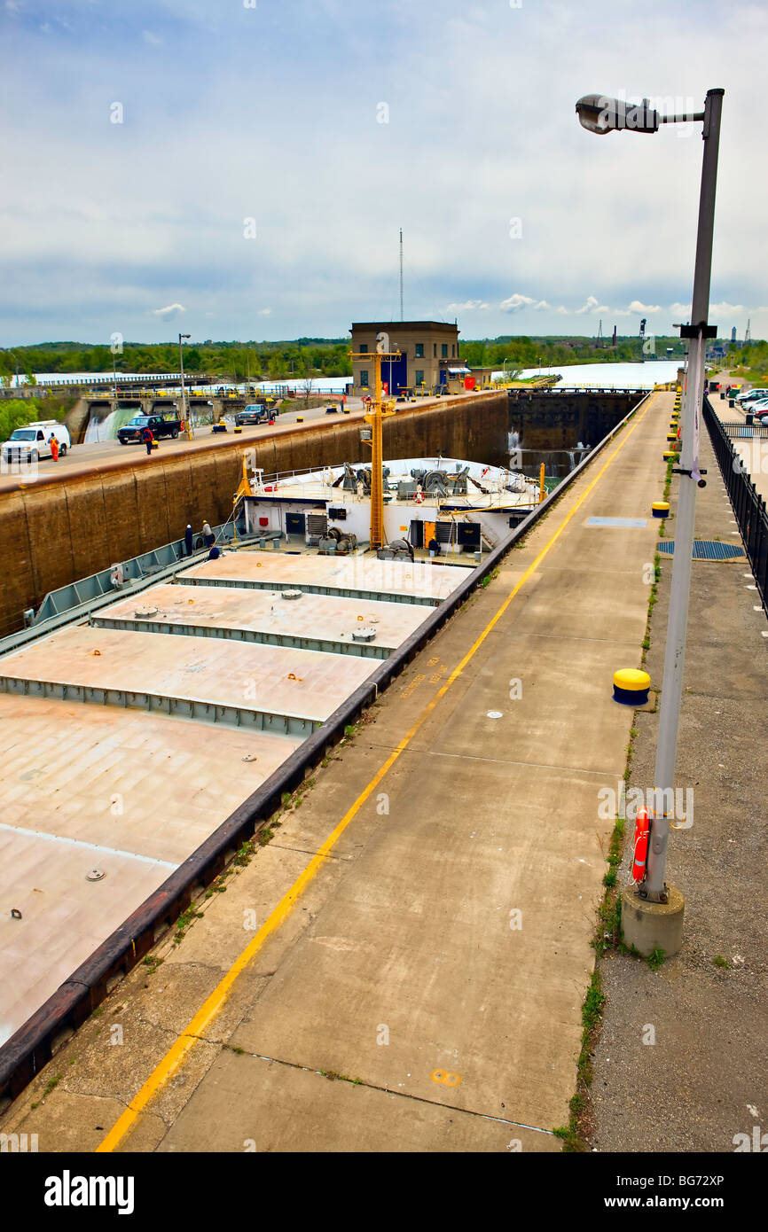 Large bulk carrier ship entering Lock 3 of the Welland Canals System at the St Catharines Museum, Welland Canals Centre, Great L Stock Photo
