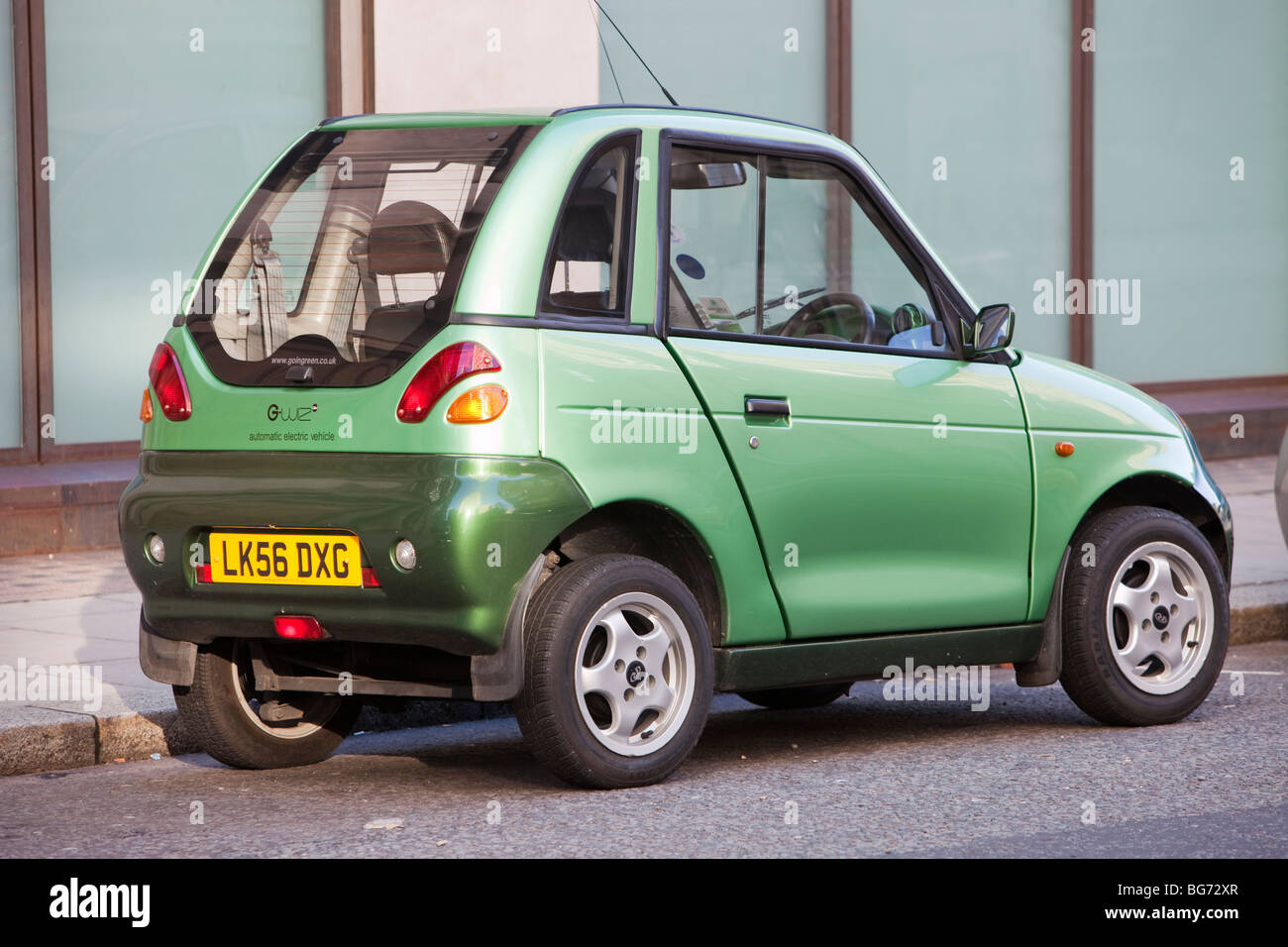 A G-Wiz electric car on the streets of London, UK. Such zero emission vehicles help to combat climate change. Stock Photo