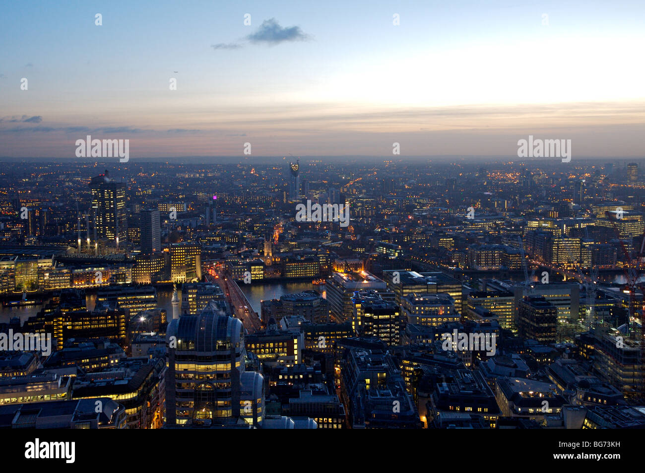 Evening aerial view from old broad street looking over Thames to south London. Stock Photo