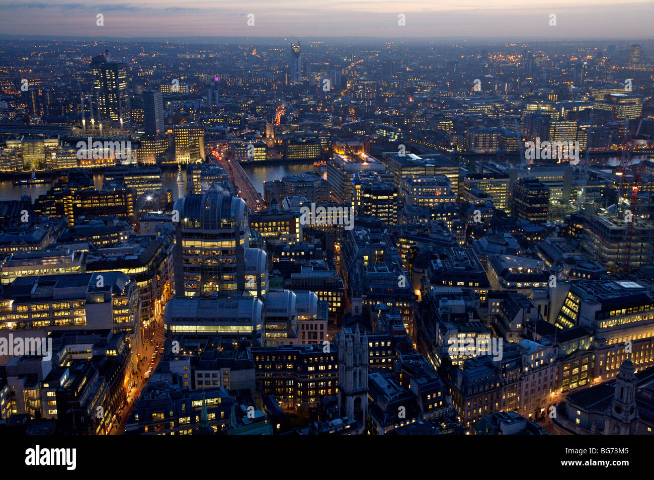 Evening aerial view from old broad street looking over Thames to south London. Stock Photo