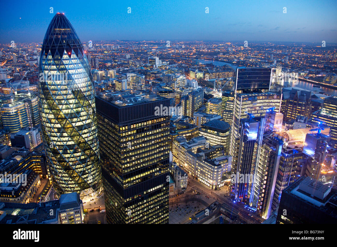 Evening aerial view from old broad street looking over to gherkin and lloyds buildings. Stock Photo