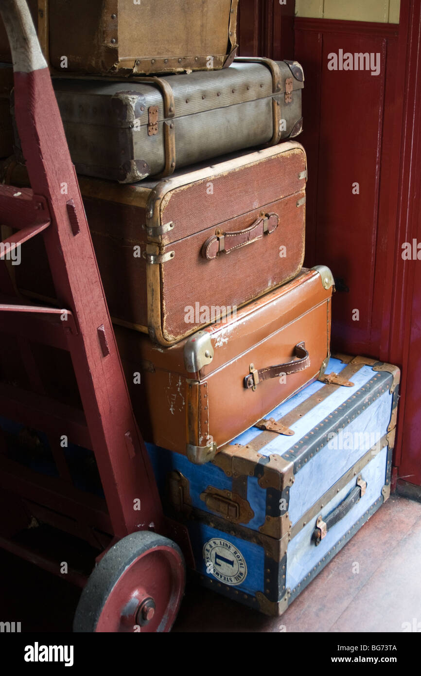 Luggage cases on a trolley for the train Stock Photo