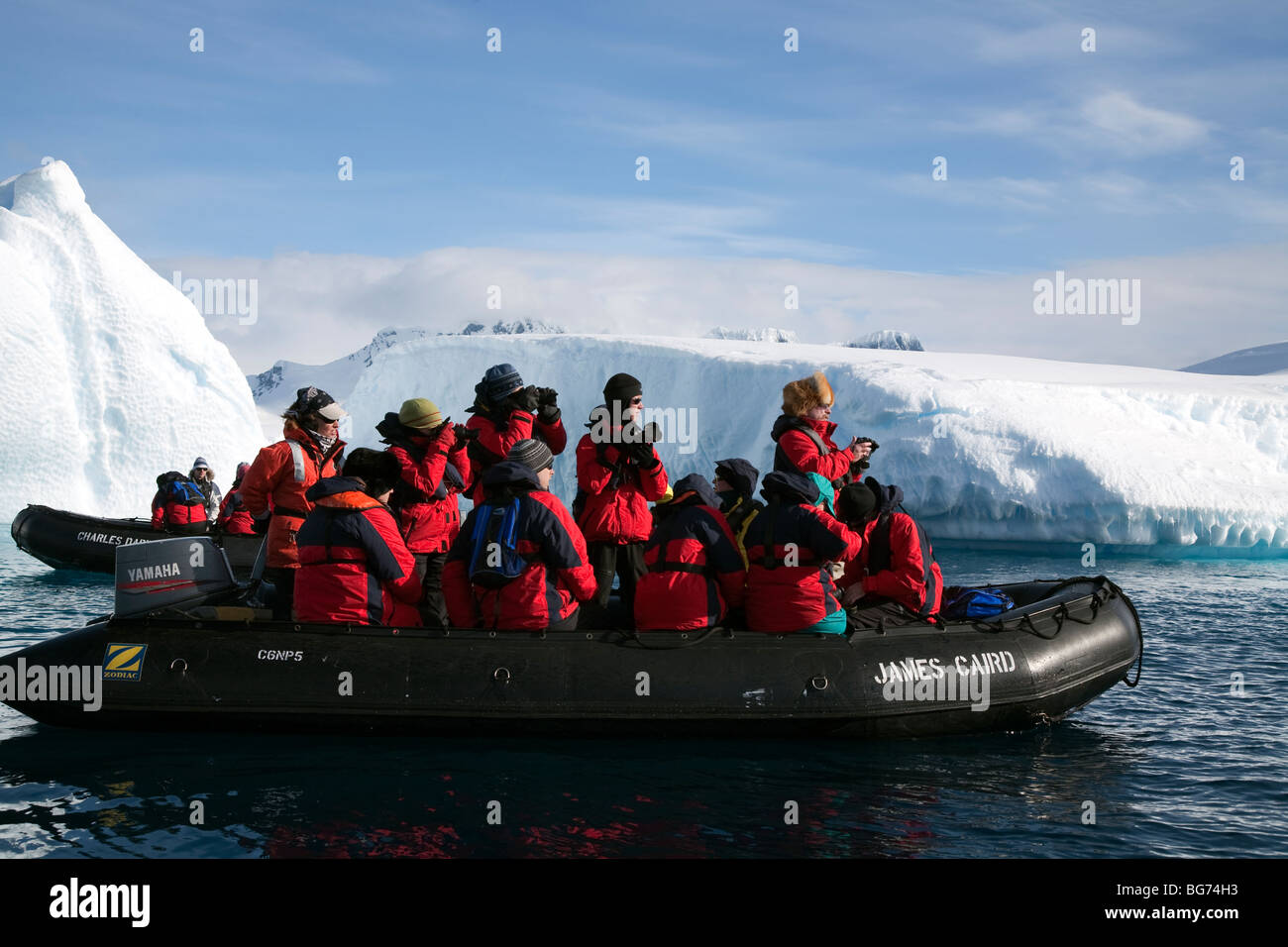 Expedition cruise ship passengers enjoying a zodiac cruise at Pleneau  Island, Antarctica Stock Photo - Alamy