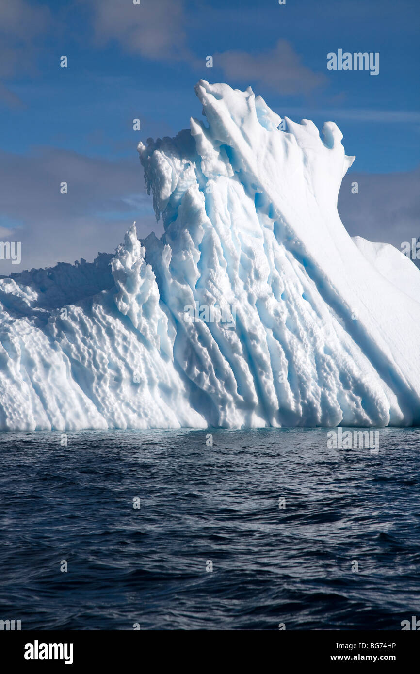 Icebergs and bergy bits off Pleneau Island, Lemaire Channel, Antarctica Stock Photo