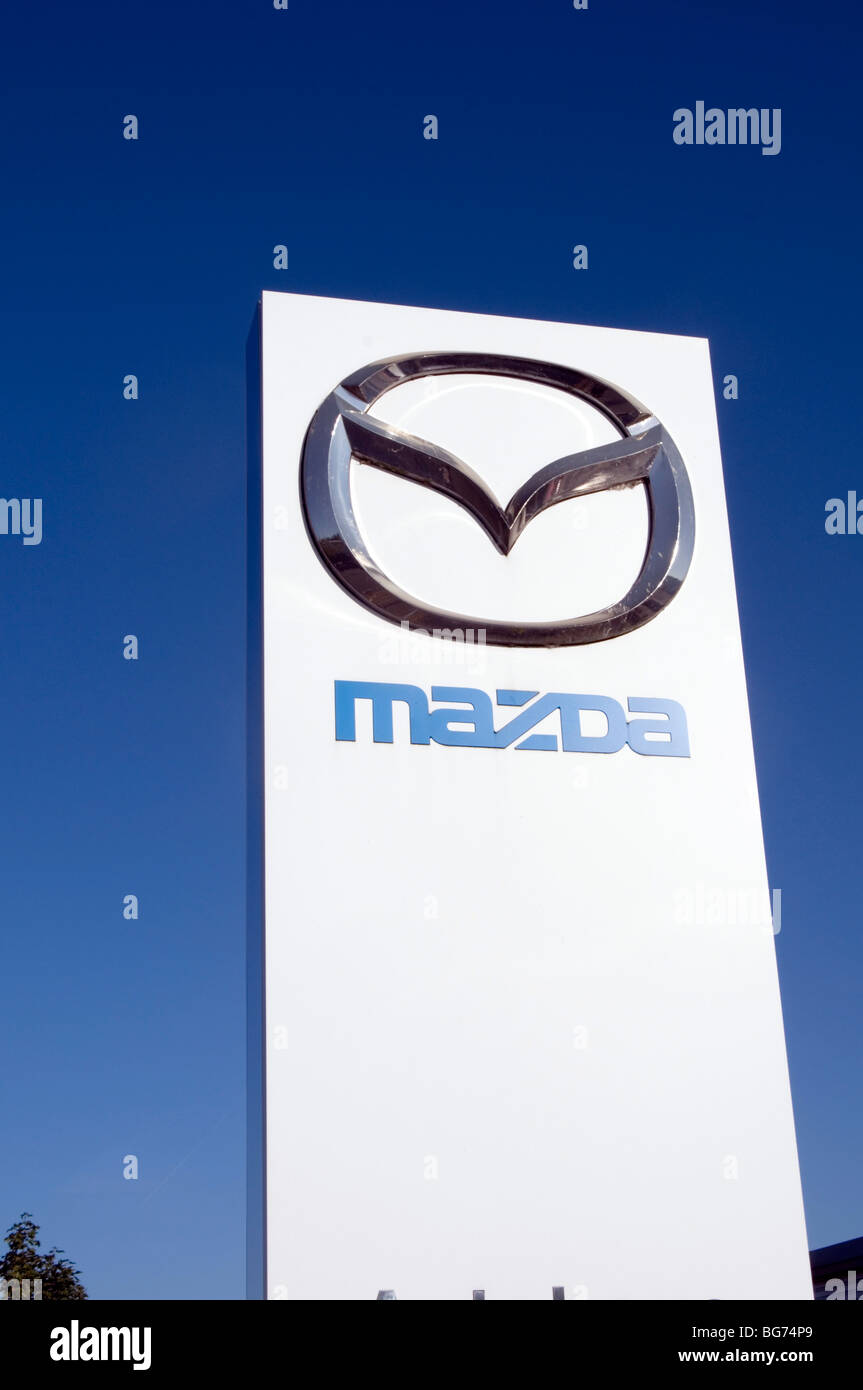 mazda car cars manufacturer maker japan Japanese import imports imported vehicle vehicles brand branding logo badge hood mascot Stock Photo