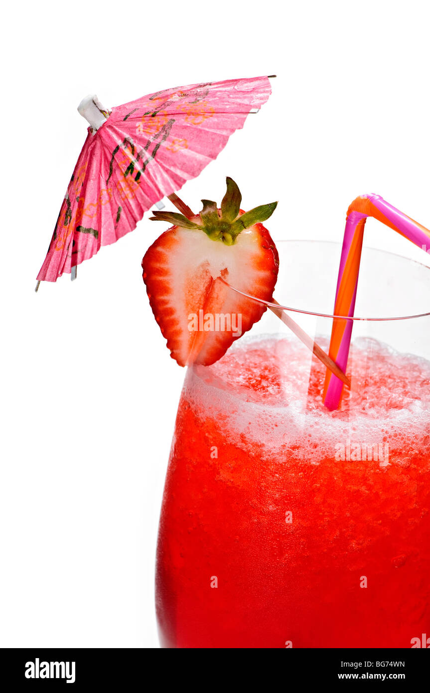 Strawberry daiquiri in glass isolated on white background with umbrella