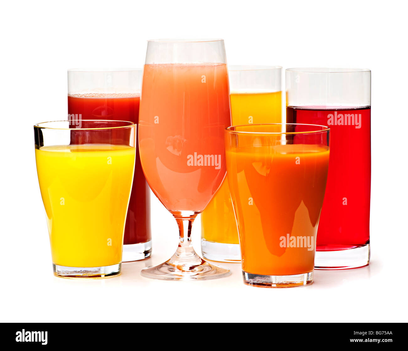 Various glasses of juices isolated on white background Stock Photo