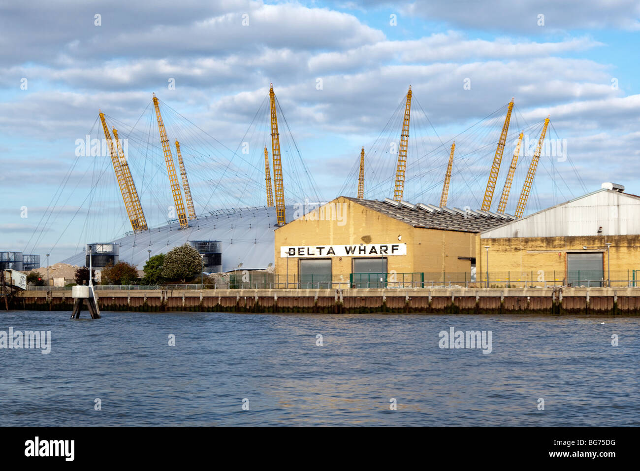 The O2 Arena and Delta Wharf from the river Thames Stock Photo