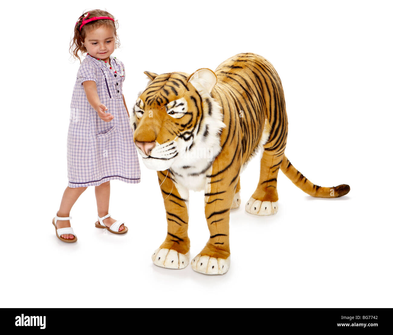 Large Toy Tiger Hannah petting Stock Photo