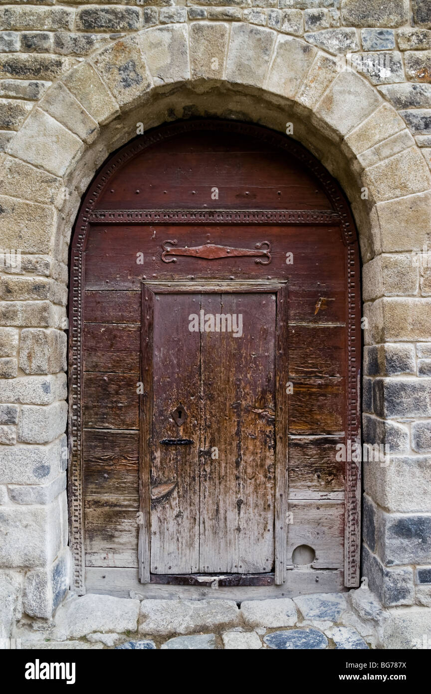 Door of a 12th century Romanesque-style church Santa Maria de Taüll. Vall de Boi, Catalonia, Spain. Stock Photo