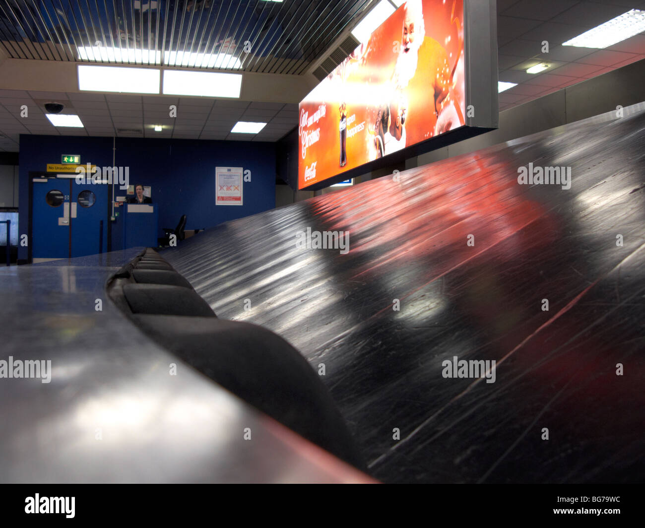empty stopped baggage reclaim carousel at belfast international airport uk Stock Photo