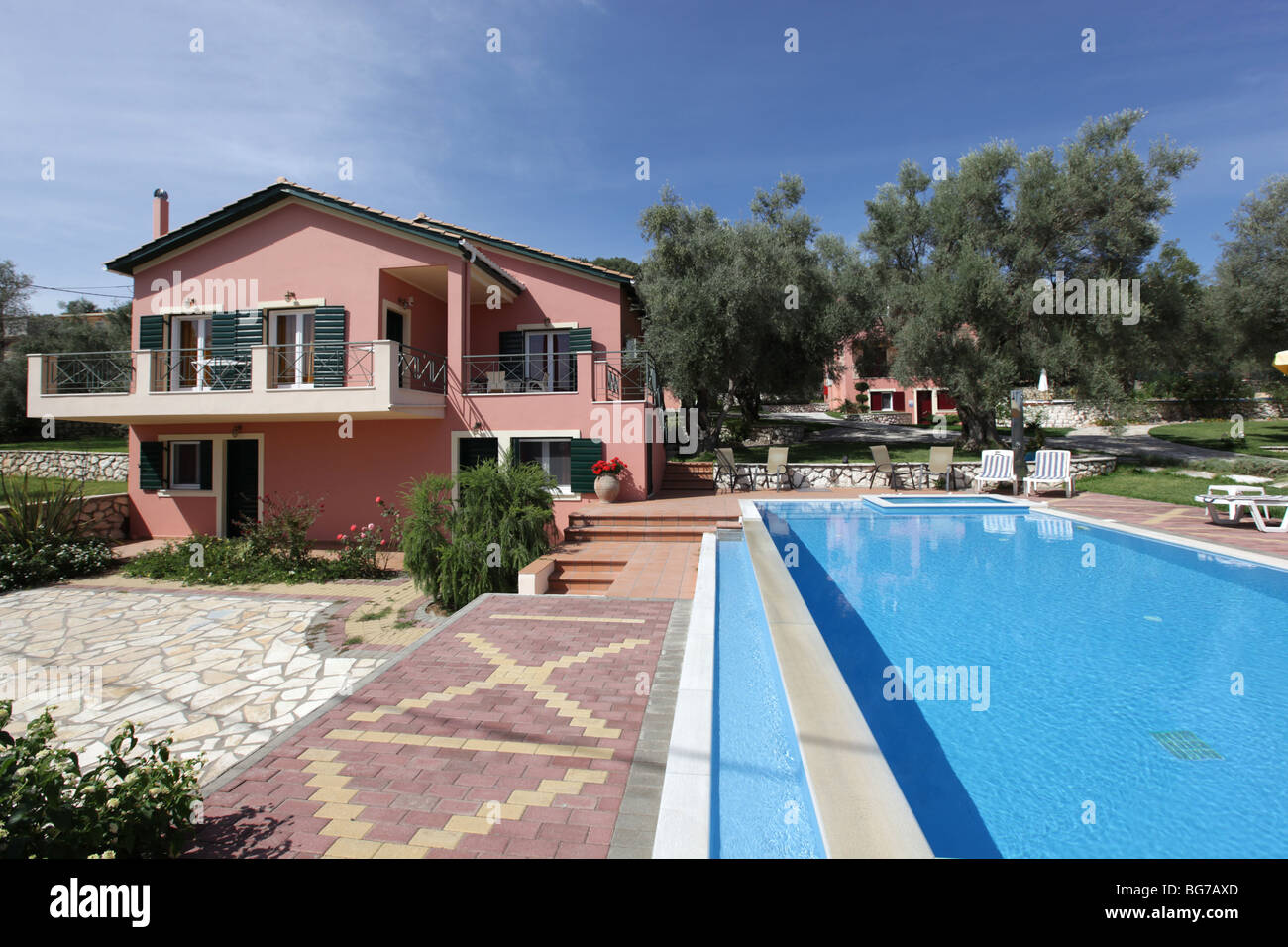 Image showcasing Luxury holiday vacation villa with a large private swimming pool. Image ...