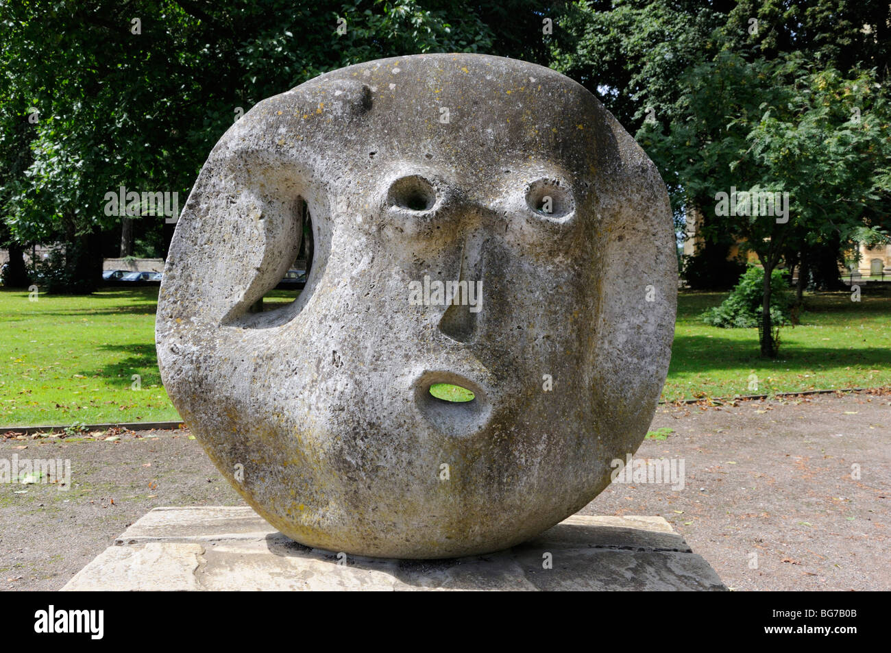 'Garden God' sculpture by Peter Inchbald outside St Andrew's Church, Pershore, Worcestershire, England, UK. Stock Photo