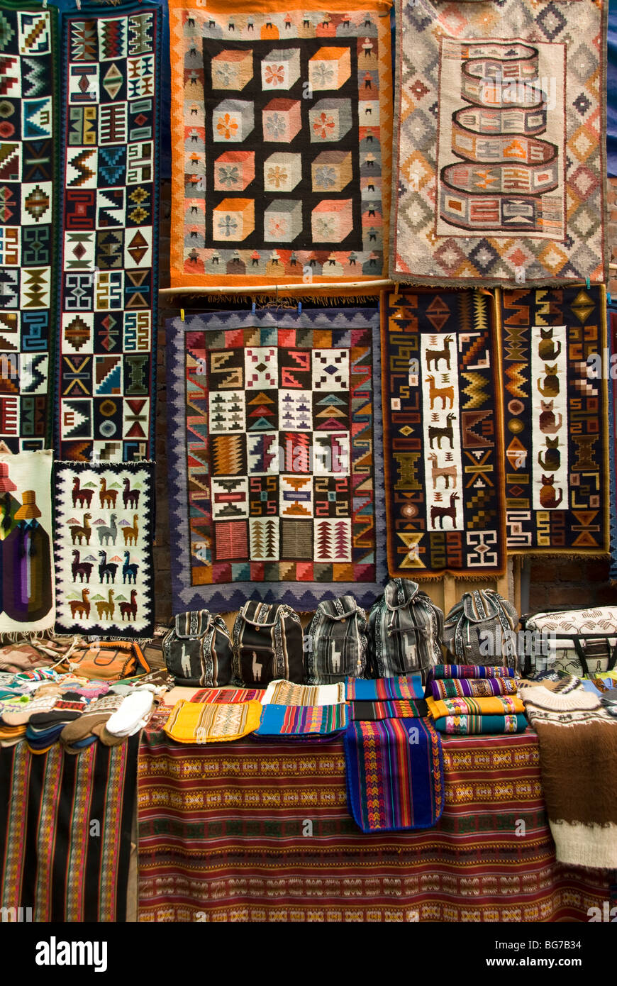 Peru, Sacred Valley, Pisac Village, textiles for sale in local market Stock Photo